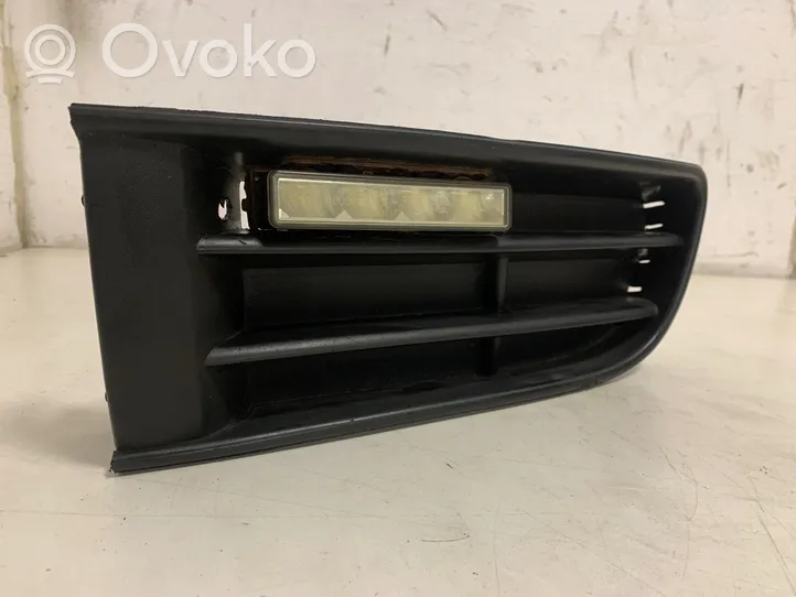 Volkswagen PASSAT B5.5 Front fog light trim/grill 2PL125L