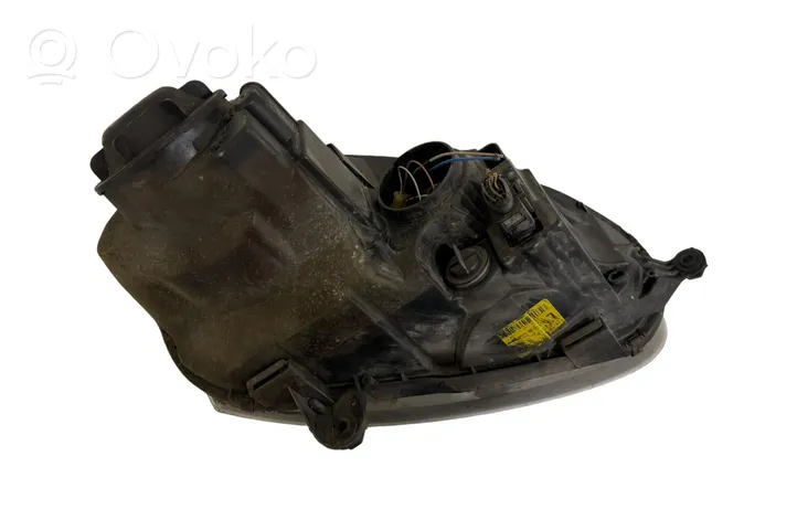 Volkswagen Golf V Lampa przednia 1K6941005A