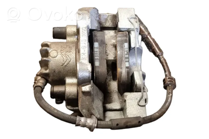 Peugeot 208 Caliper de freno delantero 9835571780