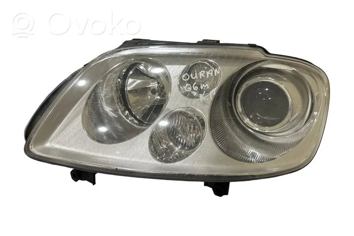 Volkswagen Touran I Lampa przednia 1T0941031K