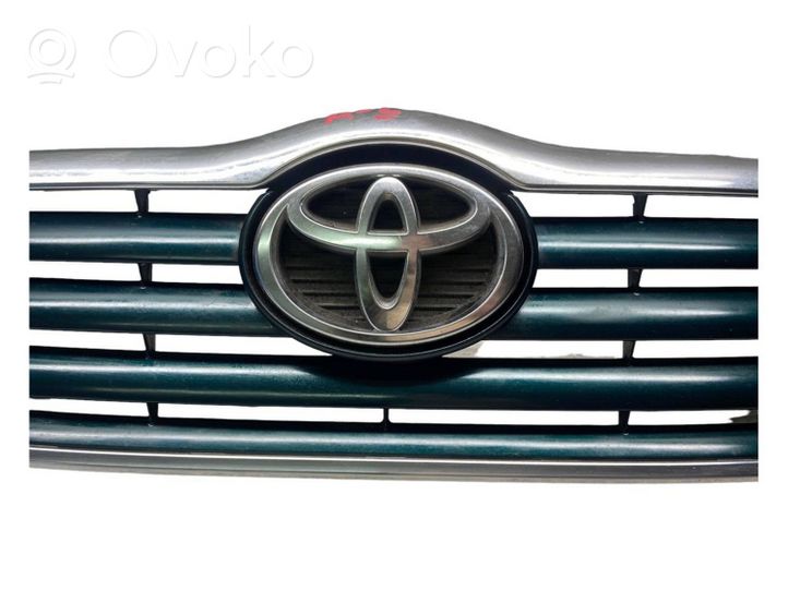 Toyota Avensis T250 Grille calandre supérieure de pare-chocs avant 32320010