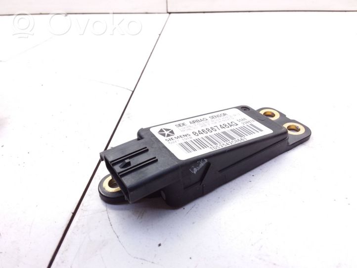 Chrysler Voyager Gaisa spilvenu trieciensensors 23087A