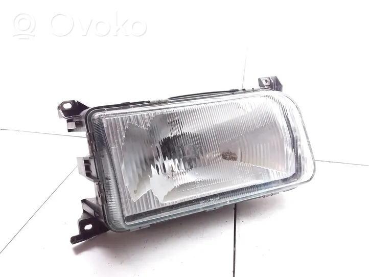 Volkswagen PASSAT B3 Lampa przednia 13348000