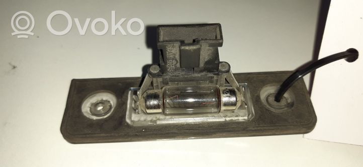 Skoda Octavia Mk2 (1Z) Lampa oświetlenia tylnej tablicy rejestracyjnej 1Z0943021B