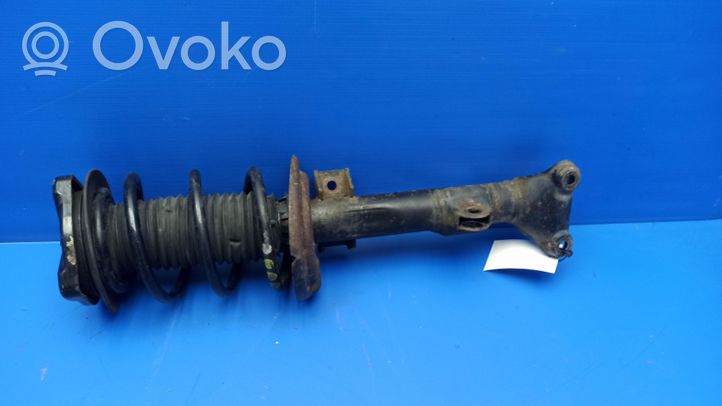 Mercedes-Benz E C207 W207 Front shock absorber with coil spring A2073207238