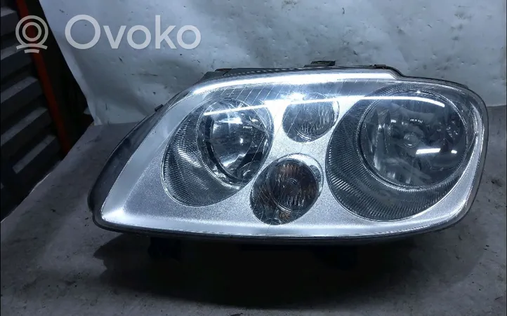 Volkswagen Touran I Lampa przednia 1T0941005R