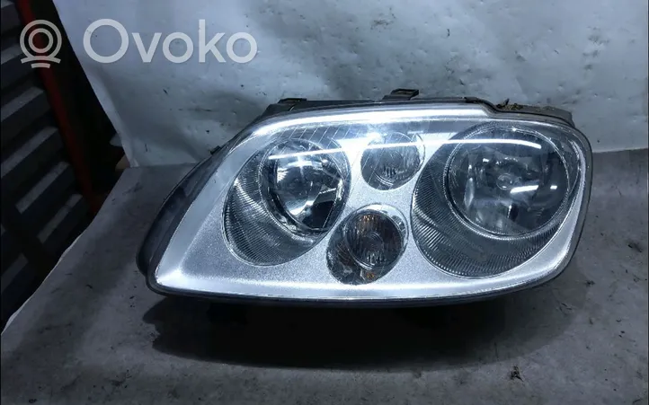 Volkswagen Touran I Lampa przednia 1T0941005R