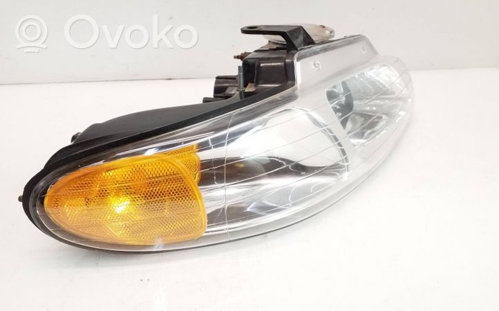 Chrysler Town & Country III Lampa przednia 4600222635