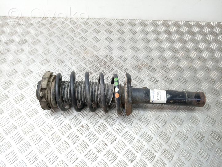 Volkswagen Caddy Front shock absorber with coil spring 824904013020