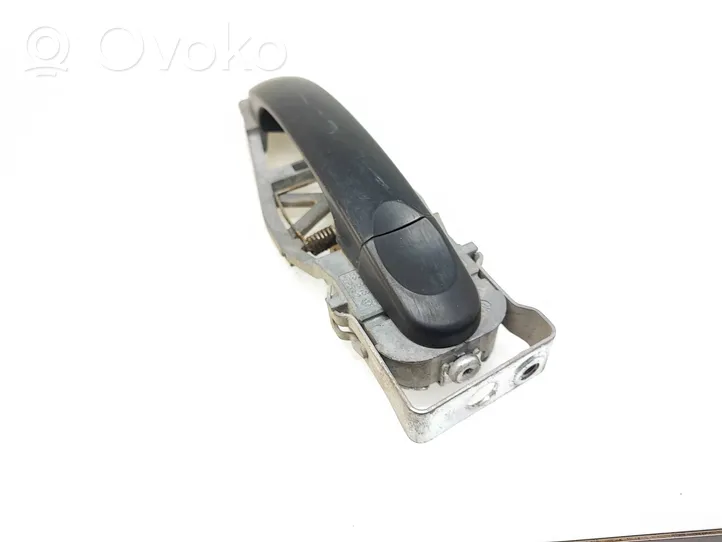 Volkswagen Caddy Front door exterior handle 1T0837886B