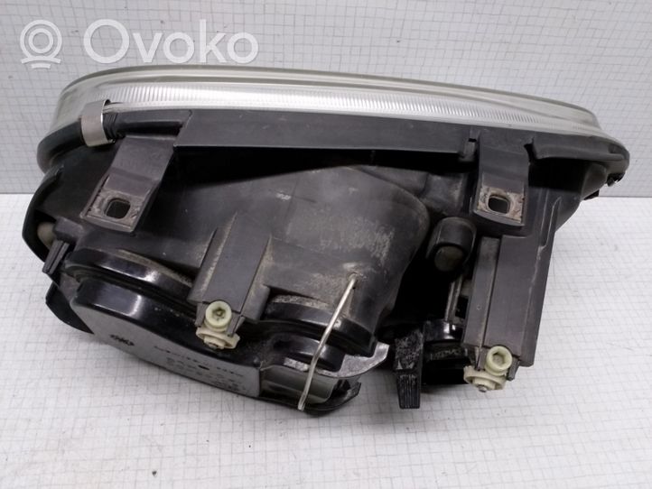 Volkswagen Golf IV Lampa przednia 15014500