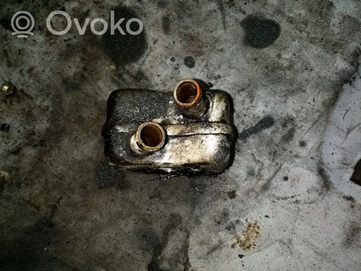 Volkswagen Golf III Supporto di montaggio del filtro dell’olio 