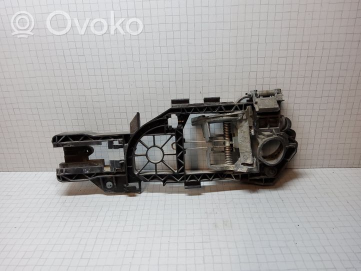 Volkswagen PASSAT B6 Etuoven ulkokahvan kehys 