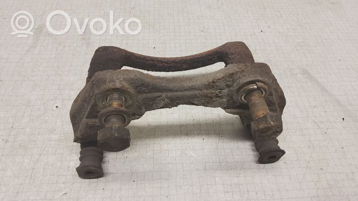 Nissan Almera N16 Caliper/mordaza del freno delantero 