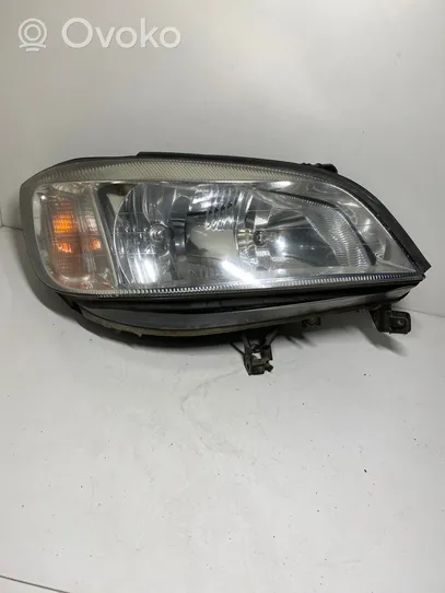 Opel Zafira A Lampa przednia 89100055