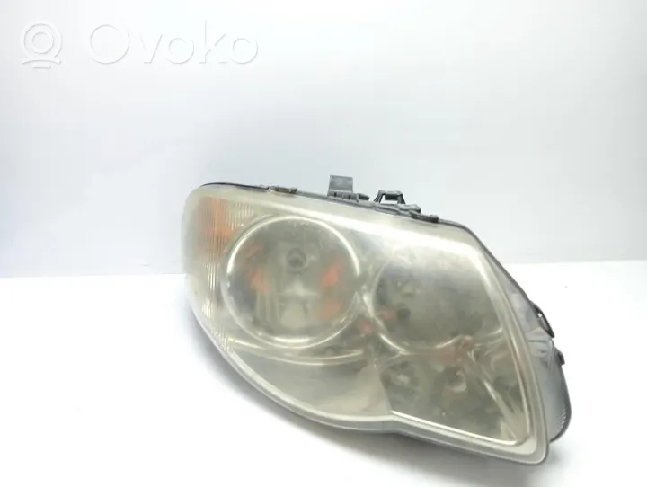 Chrysler Voyager Lampa przednia 04857830AC