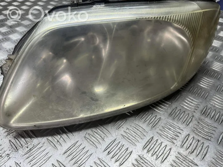 Chrysler Voyager Lampa przednia 04857703AB