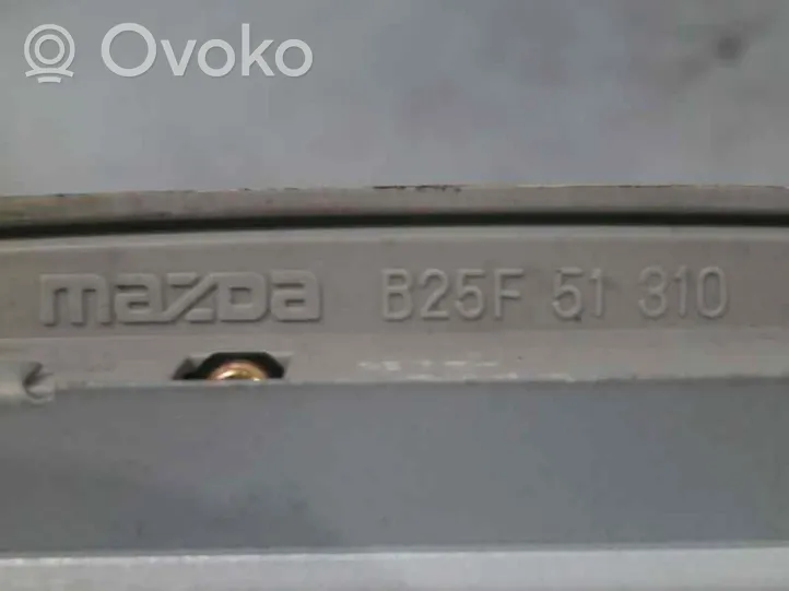 Mazda 323 F Kattokonsolin valaisinyksikön koristelista B25F51310