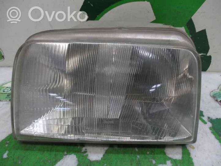 Renault Express Lampa przednia 7700811983