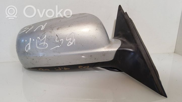 Volkswagen PASSAT B5 Front door electric wing mirror E1020479