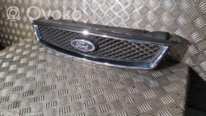Ford Focus Maskownica / Grill / Atrapa górna chłodnicy 4M518138B