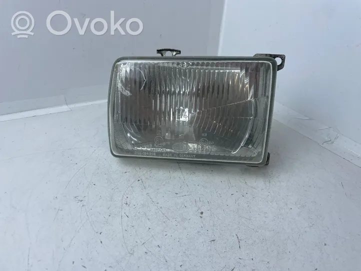 Volkswagen PASSAT Lampa przednia 321941106AF