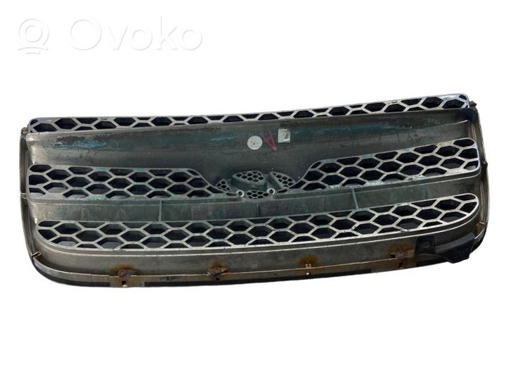 Hyundai Santa Fe Maskownica / Grill / Atrapa górna chłodnicy E865612B000