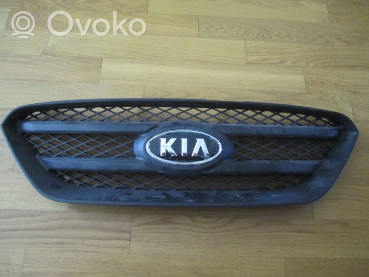 KIA Carens II Grille calandre supérieure de pare-chocs avant 8639010000