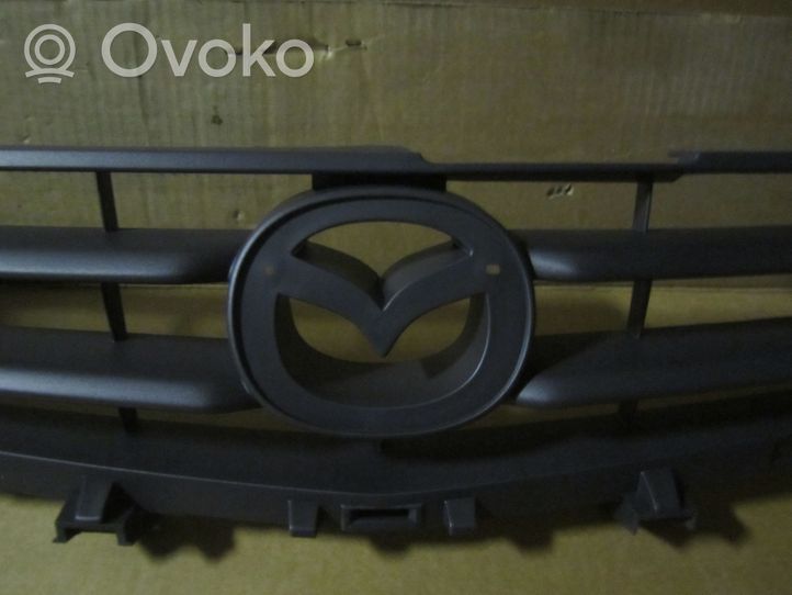 Mazda Demio Etupuskurin ylempi jäähdytinsäleikkö D26750712