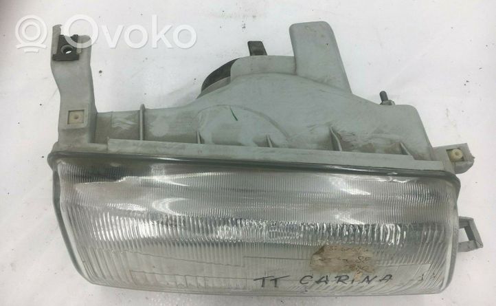 Toyota Carina T190 Передняя фара 2121128B