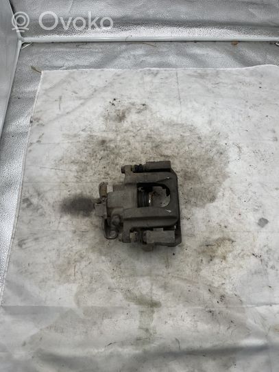 Volkswagen Touran I Caliper del freno trasero 15812301