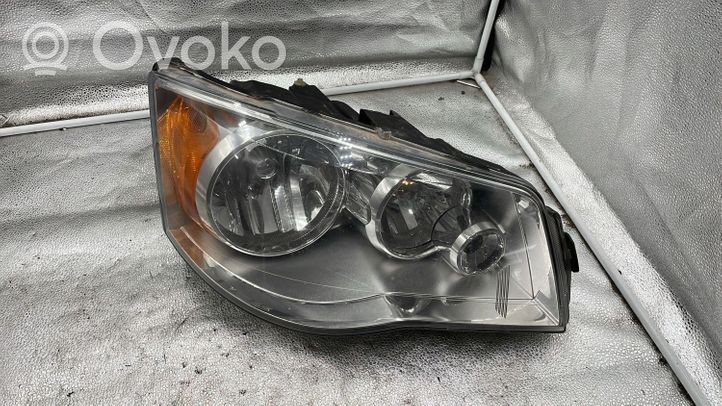 Chrysler Voyager Lampa przednia 05113336AE