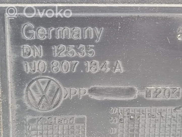 Volkswagen Golf IV Etupuskurin kannake 1J0807184A