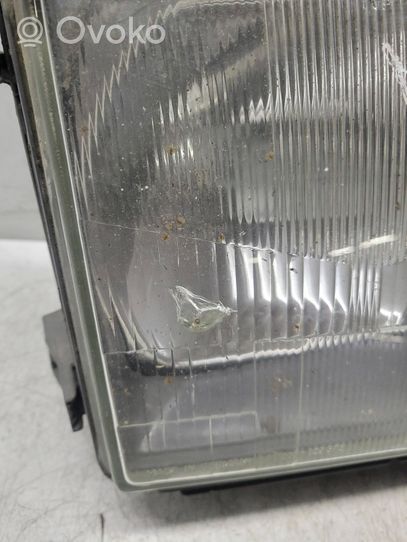 Mercedes-Benz E W124 Lampa przednia 1305363959