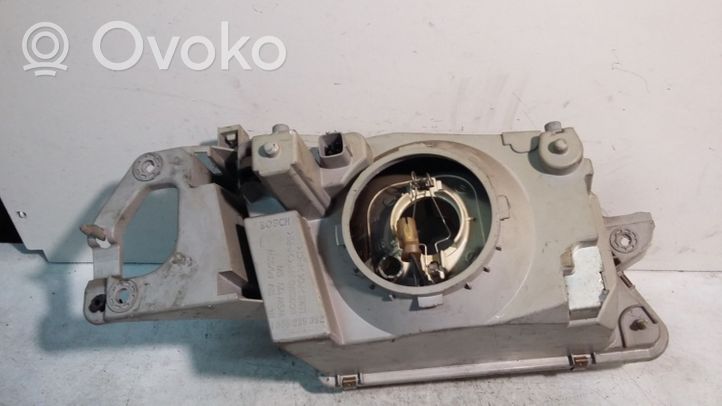 Mazda 323 F Lampa przednia 1305235392