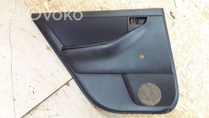 Toyota Corolla E120 E130 Garniture de panneau carte de porte avant 6776412050