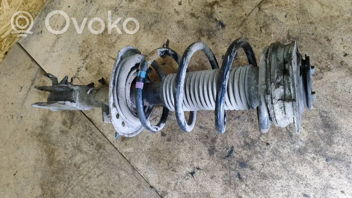 Nissan Qashqai Amortyzator osi przedniej ze sprężyną 54303JD03A