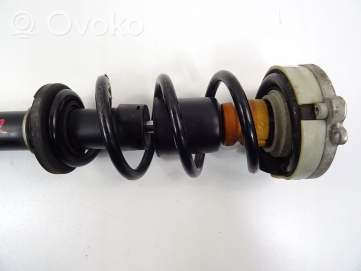 Audi A4 S4 B9 Front shock absorber with coil spring 8W0413031BA