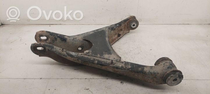 Volkswagen PASSAT B5.5 Braccio di controllo sospensione posteriore superiore/braccio oscillante 4B0505312