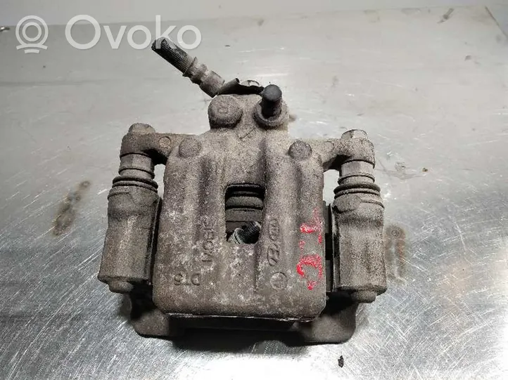 Hyundai ix35 Mordaza caliper del freno trasero 582302Y310