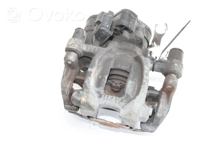 BMW 1 F40 Caliper del freno trasero 