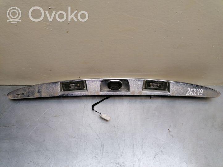 KIA Carens II Lampa oświetlenia tylnej tablicy rejestracyjnej 735335751