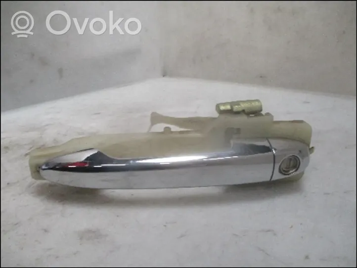 KIA Carens II Front door exterior handle 826501D010