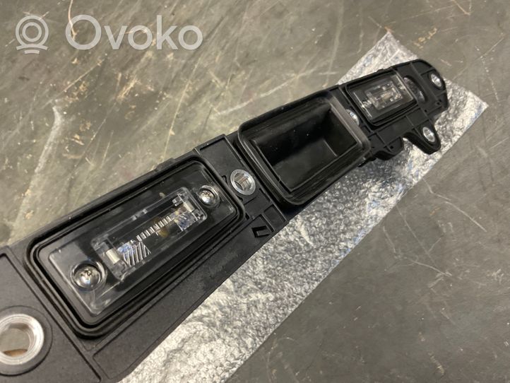 Volkswagen Touran I Trunk door license plate light bar 1T0827574A