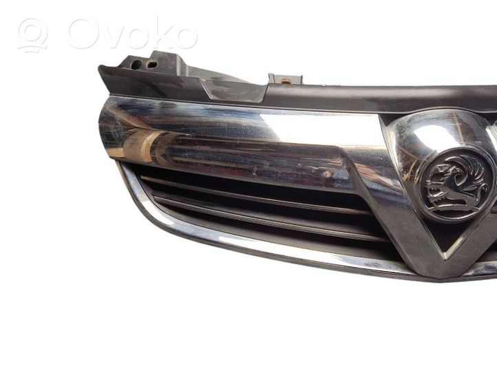 Opel Zafira B Grille calandre supérieure de pare-chocs avant 13247330