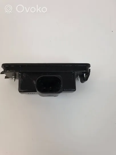 Volkswagen PASSAT B5.5 Lampa oświetlenia tylnej tablicy rejestracyjnej 1J6943021B