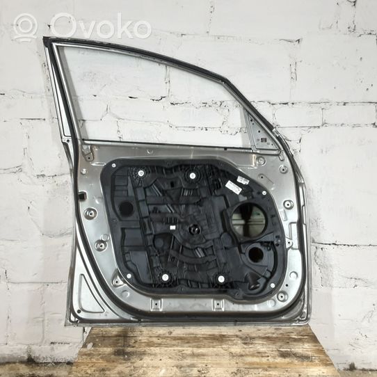 KIA Carens III Front door 5045