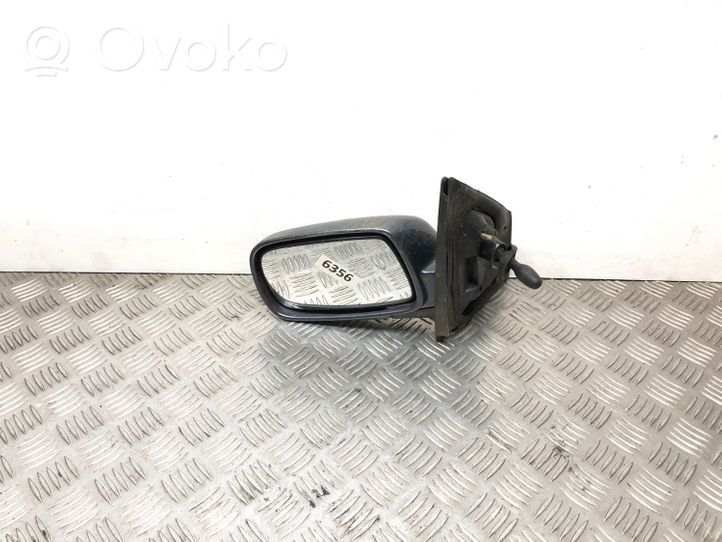 Toyota Yaris Manualne lusterko boczne drzwi przednich E1010673