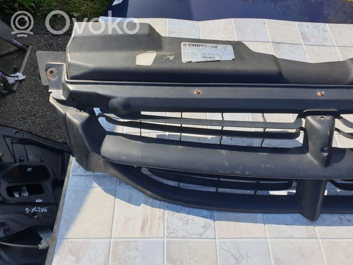 Chrysler Voyager Atrapa chłodnicy / Grill 04576955