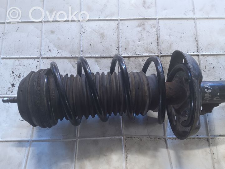 Opel Corsa D Front shock absorber with coil spring 13214354